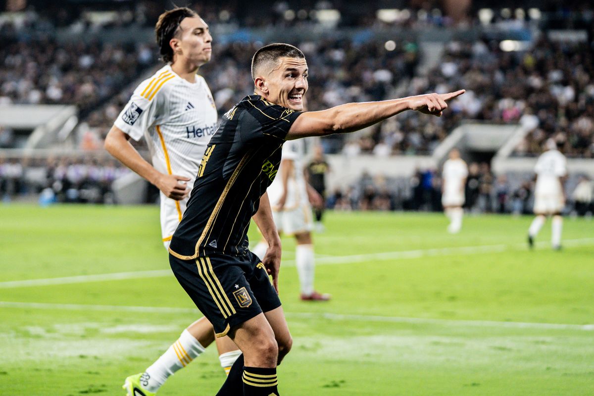 LAFC Midfielder Sergi Palencia (14) points at the ref for missing a call in a game against the LA Galaxy, Saturday July 19, 2025 in Los Angeles, Calif.