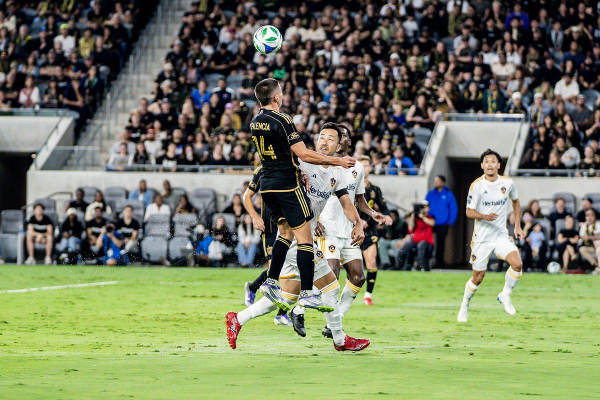 LAFC Midfielder Sergi Palencia (14) tries a header towards the goal in a game against the LA Galaxy, Saturday July 19, 2025 in Los Angeles, Calif.