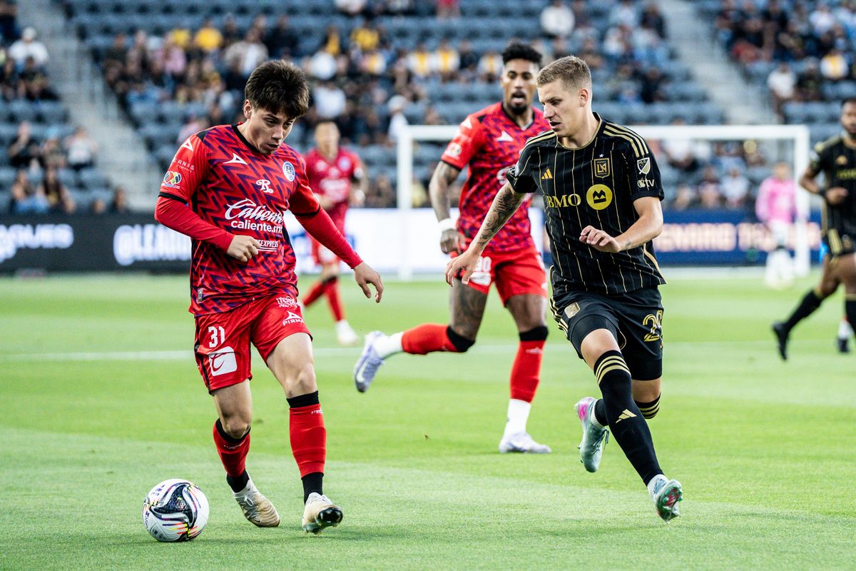 LAFC Defender Artem Smolyakov (29) tries to steal the ball in a game against Maztlan FC, Tuesday July 29, 2025 in Los Angeles, Calif.