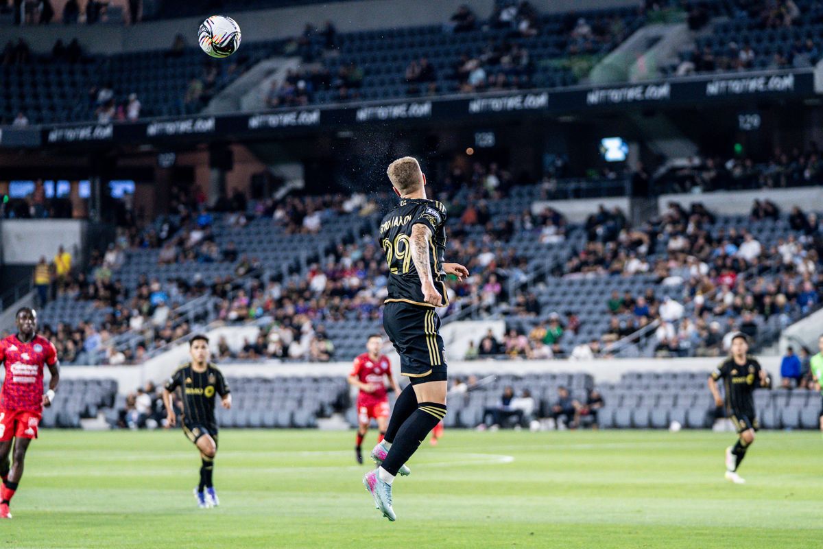 LAFC Defender Artem Smolyakov (29) attempts a header in a game against Maztlan FC, Tuesday July 29, 2025 in Los Angeles, Calif.