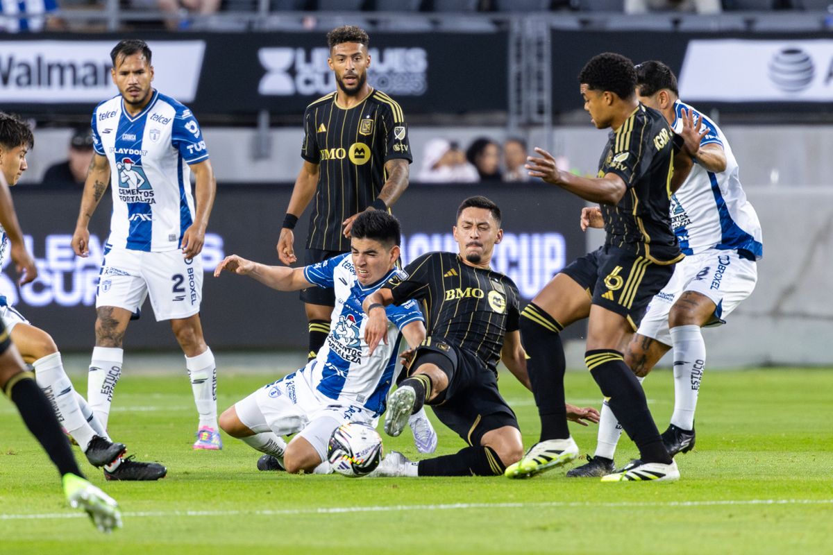 LAFC midfielder Marco Delgado (8) and Pachuca midfielder Pedro Pedraza (5) battle for the ball during a Leagues Cup, Friday August 1, 2025 in Los Angeles, Calif.