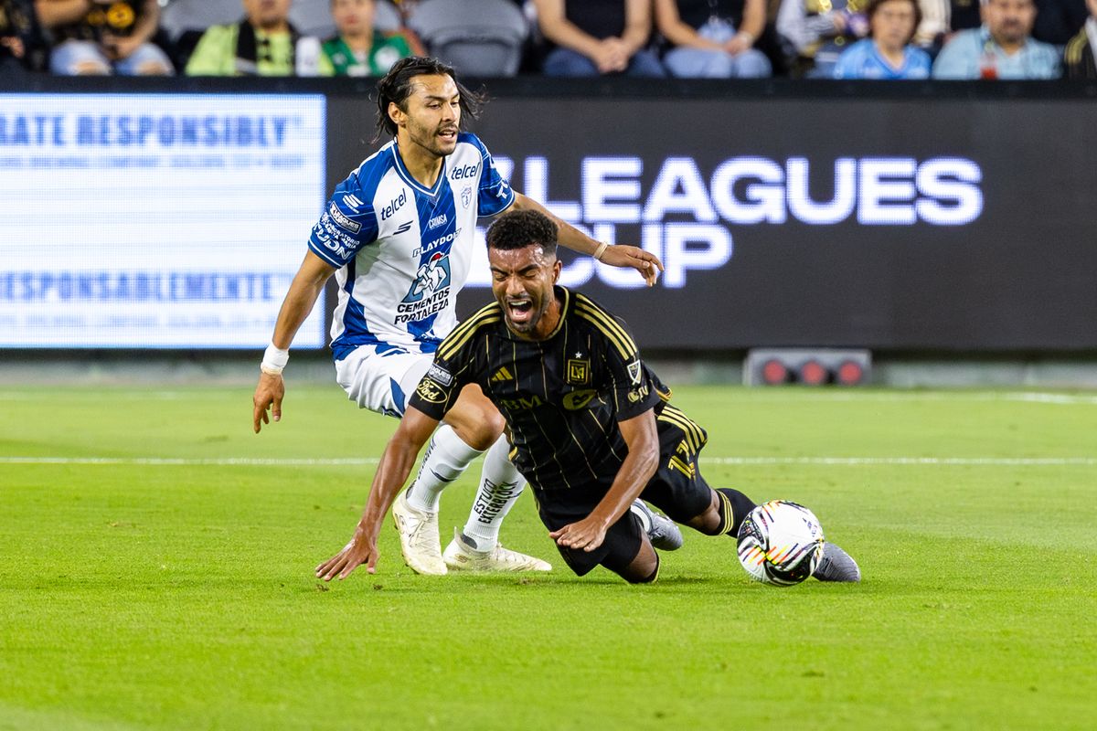 LAFC midfielder Timothy Tillman (11) takes a hard fall during a Leagues Cup match against Pachuca, Friday August 1, 2025 in Los Angeles, Calif.