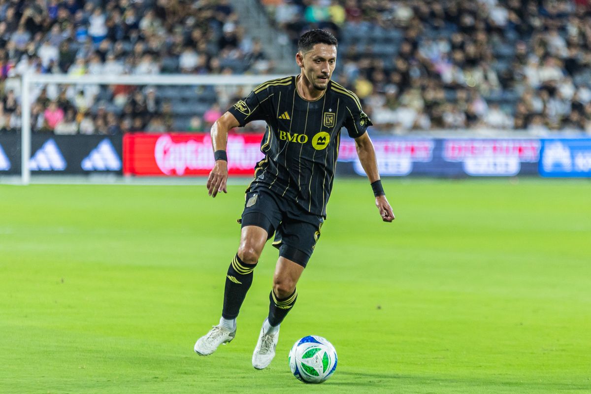 LAFC midfielder Marco Delgado (8) dribbles the ball during a MLS soccer game against Atlanta United FC, Sunday, October 5, 2025, in Los Angeles, California. LAFC midfielder Marco Delgado (8) dribbles the ball during a MLS soccer game against Atlanta United FC, Sunday, October 5, 2025, in Los Angeles, California.