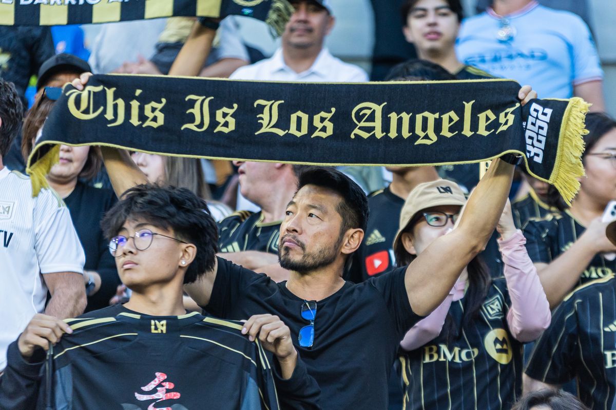 An LAFC fan holds up a scarf during a MLS soccer game against Atlanta United FC, Sunday, October 5, 2025, in Los Angeles, California. An LAFC fan holds up a scarf during a MLS soccer game against Atlanta United FC, Sunday, October 5, 2025, in Los Angeles, California.