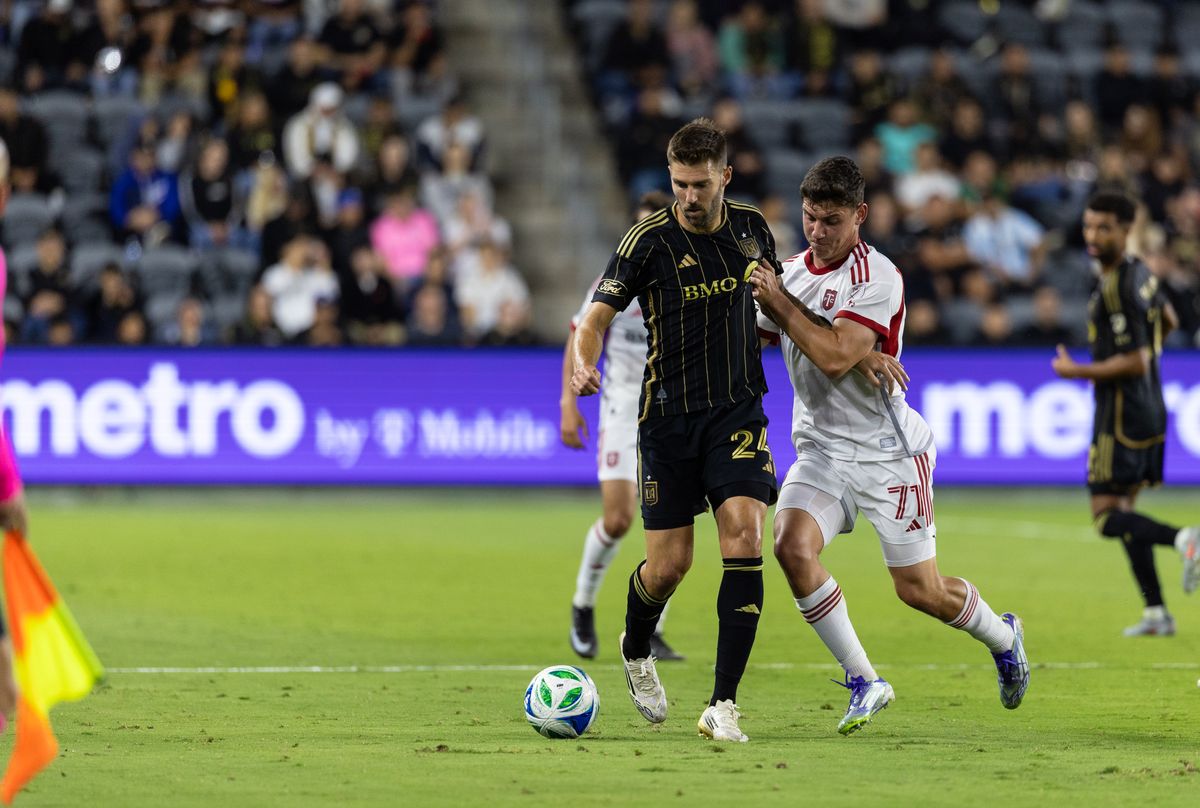 LAFC defender Ryan Hollingshead (24) battles during a MLS soccer game against the Toronto FC, Wednesday, October 8, 2025, in Los Angeles, California. LAFC defender Ryan Hollingshead (24) battles during a MLS soccer game against the Toronto FC, Wednesday, October 8, 2025, in Los Angeles, California.
