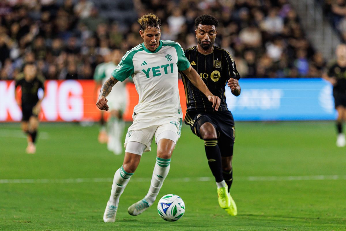 LAFC M Timothy Tillman (11) and Austin FC M Nicolas Dubersarsky (20) battle for the ball during an MLS Playoff game against Austin FC, Wednesday October 29, 2025 in Los Angeles, California.