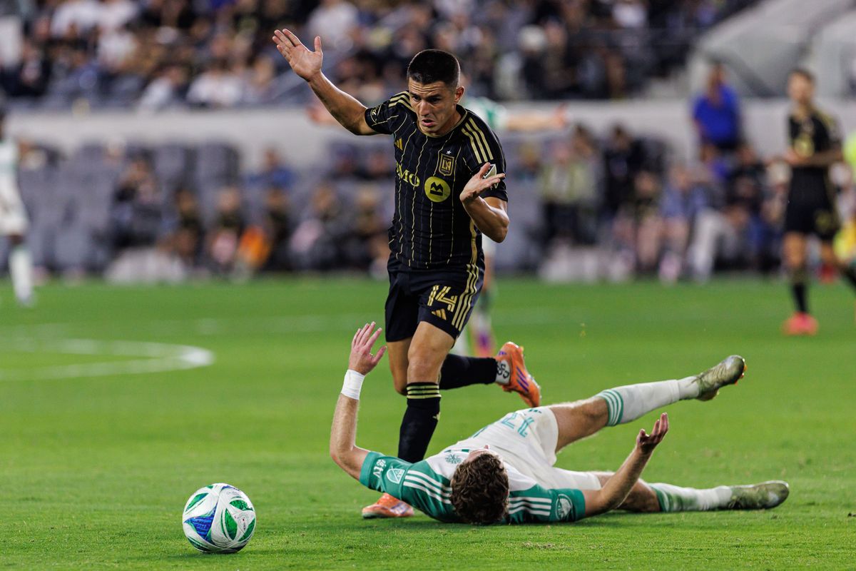 LAFC D Sergi Palencia (14) fouls Austin FC D Jon Gallagher (17) during an MLS Playoff game against Austin FC, Wednesday October 29, 2025 in Los Angeles, California.