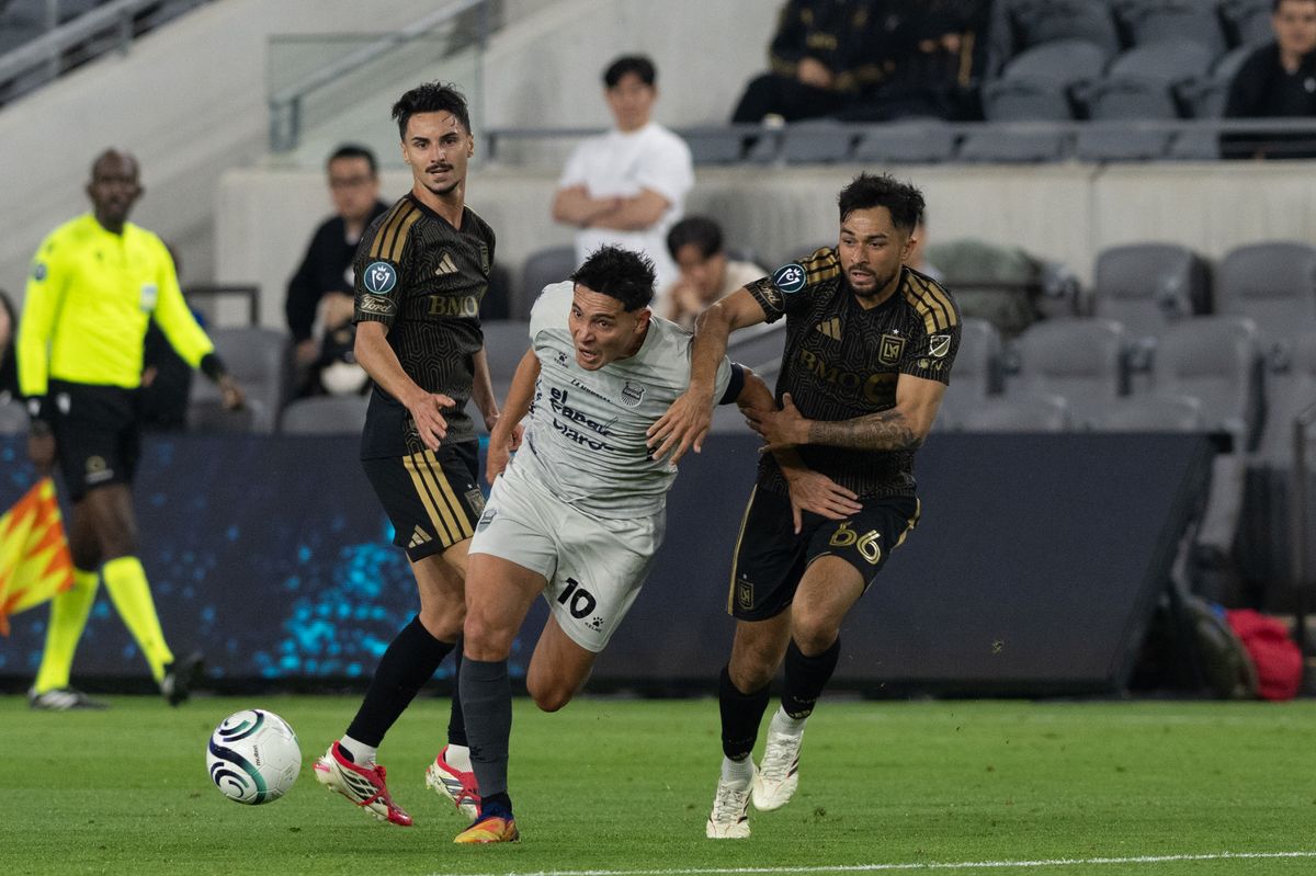 Real Espana midfielder Jhow Benavidez (10) gets tackled during a CONCACAF game between LAFC and Real Espana on Friday, February 24,2026 at BMO Stadium in Los Angeles Calif Real Espana midfielder Jhow Benavidez (10) gets tackled during a CONCACAF game between LAFC and Real Espana on Friday, February 24,2026 at BMO Stadium in Los Angeles Calif