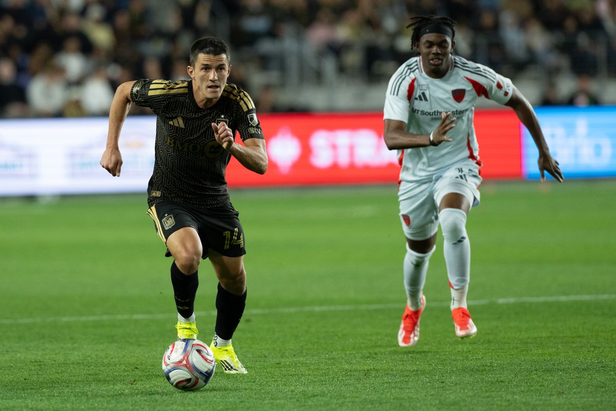 LAFC defender Sergi Palencia (14) pushes the ball forward during an MLS game between LAFC and FC Dallas on Saturday, March 7, 2026 at BMO Stadium in Los Angeles Calif