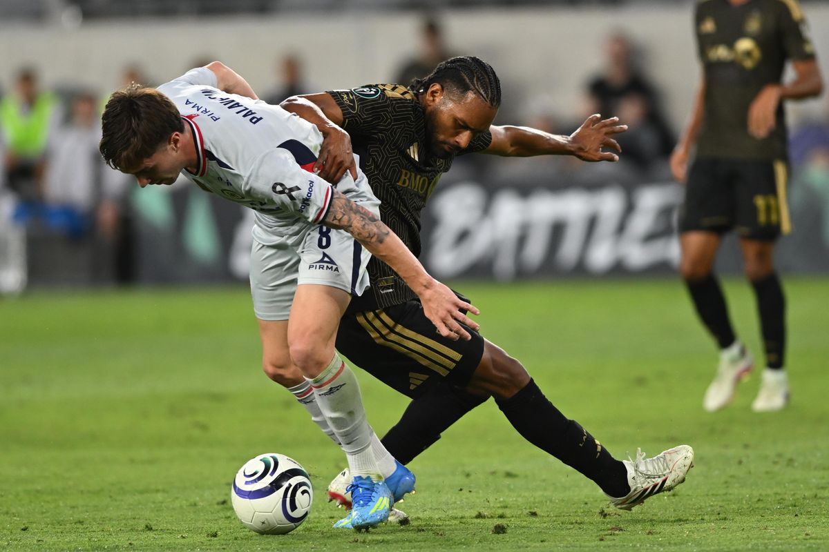 LAFC defender Eddie Segura (4) battles for possession against Cruz Azul midfielder Agustín Palavecino (8) during a CONCACAF Champions match between LAFC and Cruz Azul on Tuesday, April 7, 2026 at BMO Stadium in Los Angeles Calif LAFC defender Eddie Segura (4) battles for possession against Cruz Azul midfielder Agustín Palavecino (8) during a CONCACAF Champions match between LAFC and Cruz Azul on Tuesday, April 7, 2026 at BMO Stadium in Los Angeles Calif
