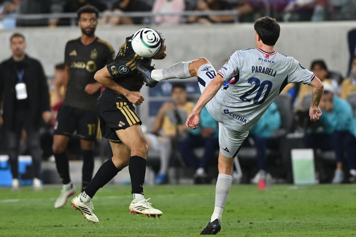LAFC midfielder Mathieu Choinière (66) heads the ball during a CONCACAF Champions match between LAFC and Cruz Azul on Tuesday, April 7, 2026 at BMO Stadium in Los Angeles Calif LAFC midfielder Mathieu Choinière (66) heads the ball during a CONCACAF Champions match between LAFC and Cruz Azul on Tuesday, April 7, 2026 at BMO Stadium in Los Angeles Calif