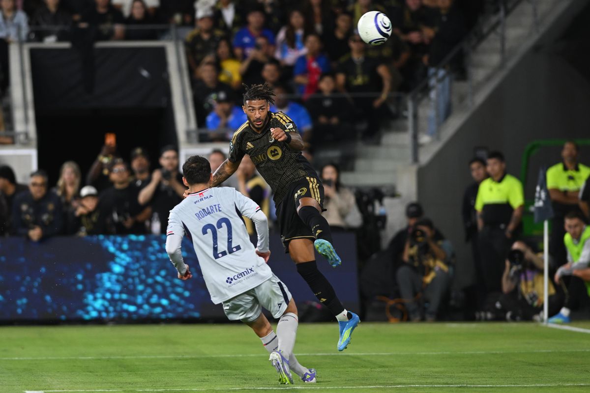 LAFC forward Denis Bouanga (99) heads the ball during a CONCACAF Champions match between LAFC and Cruz Azul on Tuesday, April 7, 2026 at BMO Stadium in Los Angeles Calif LAFC forward Denis Bouanga (99) heads the ball during a CONCACAF Champions match between LAFC and Cruz Azul on Tuesday, April 7, 2026 at BMO Stadium in Los Angeles Calif