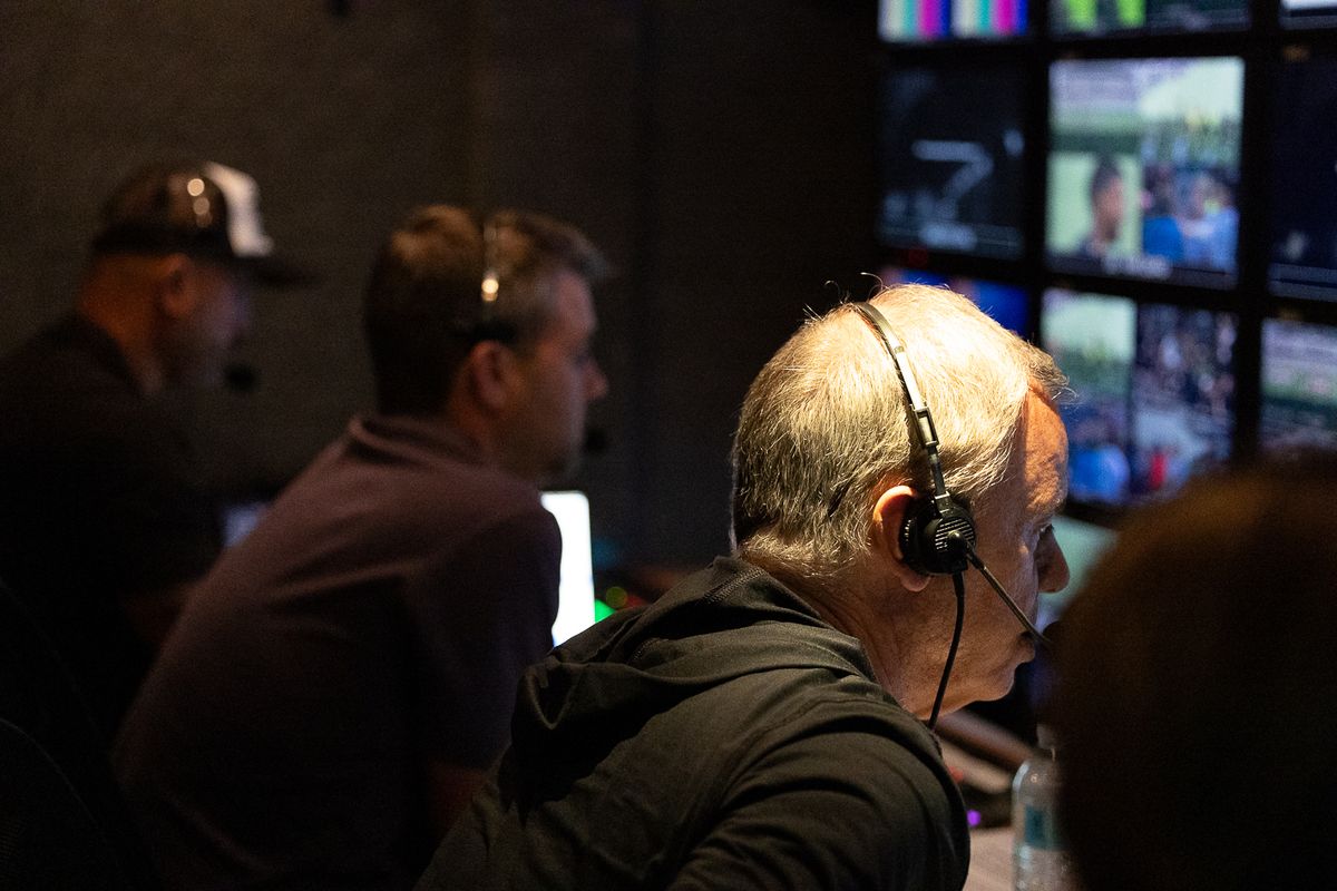 Brad Merte (producer) and Jim Dadonna (director) prepare for a MLS match broadcast on Apple TV.