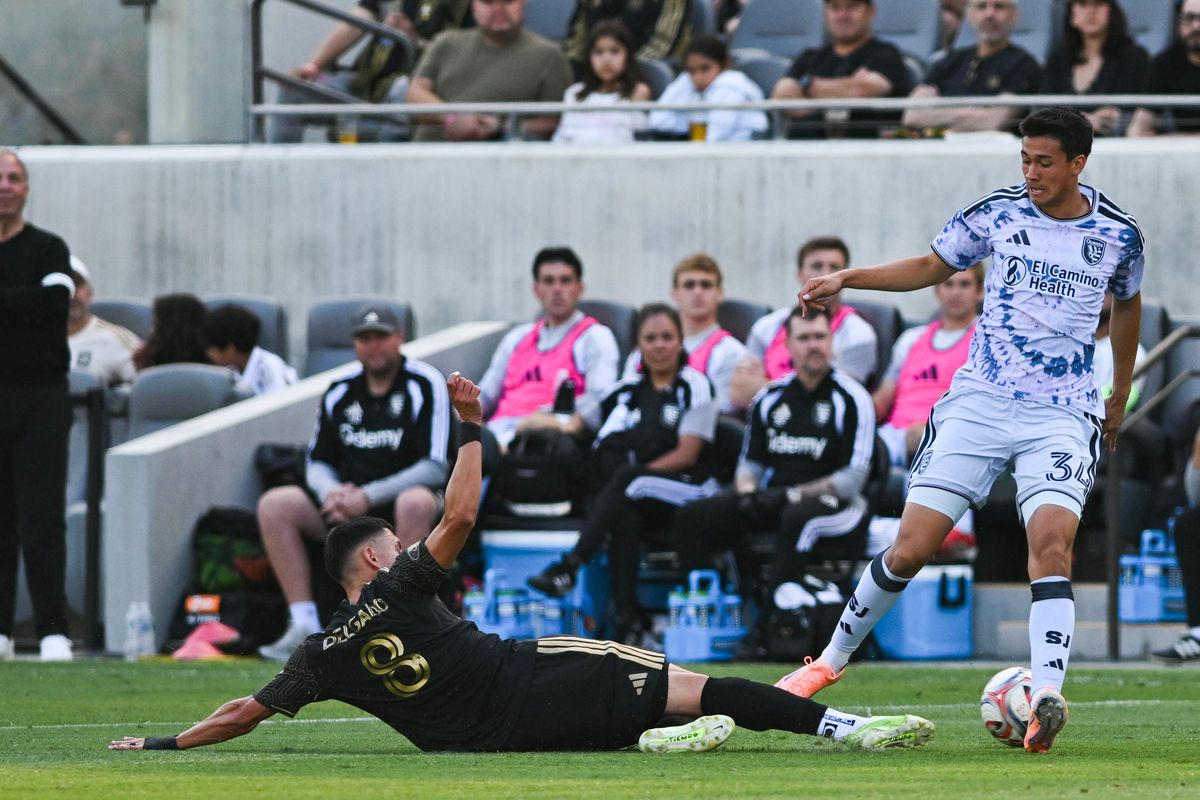 LAFC midfielder Mark Delgado (8) slides for an interception during an MLS game between LAFC and San Jose Earthquakes on Sunday, April 19, 2026 at BMO Stadium In Los Angeles Calif at BMO Stadium in Los Angeles Calif
