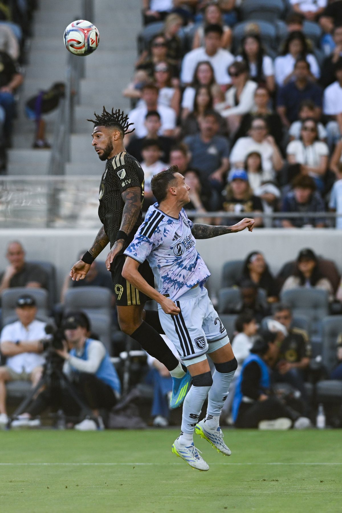 LAFC forward Denis Bouanga (99) heads the ball during an MLS game between LAFC and San Jose Earthquakes on Sunday, April 19, 2026 at BMO Stadium In Los Angeles Calif at BMO Stadium in Los Angeles Calif