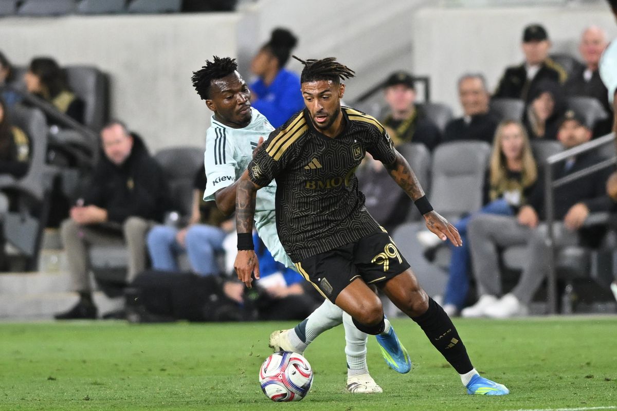 LAFC forward Denis Bouanga (99) dribbles around the defense during an MLS game between LAFC and Colorado Rapids on Wednesday, April 22, 2026 at BMO Stadium In Los Angeles Calif at BMO Stadium in Los Angeles Calif