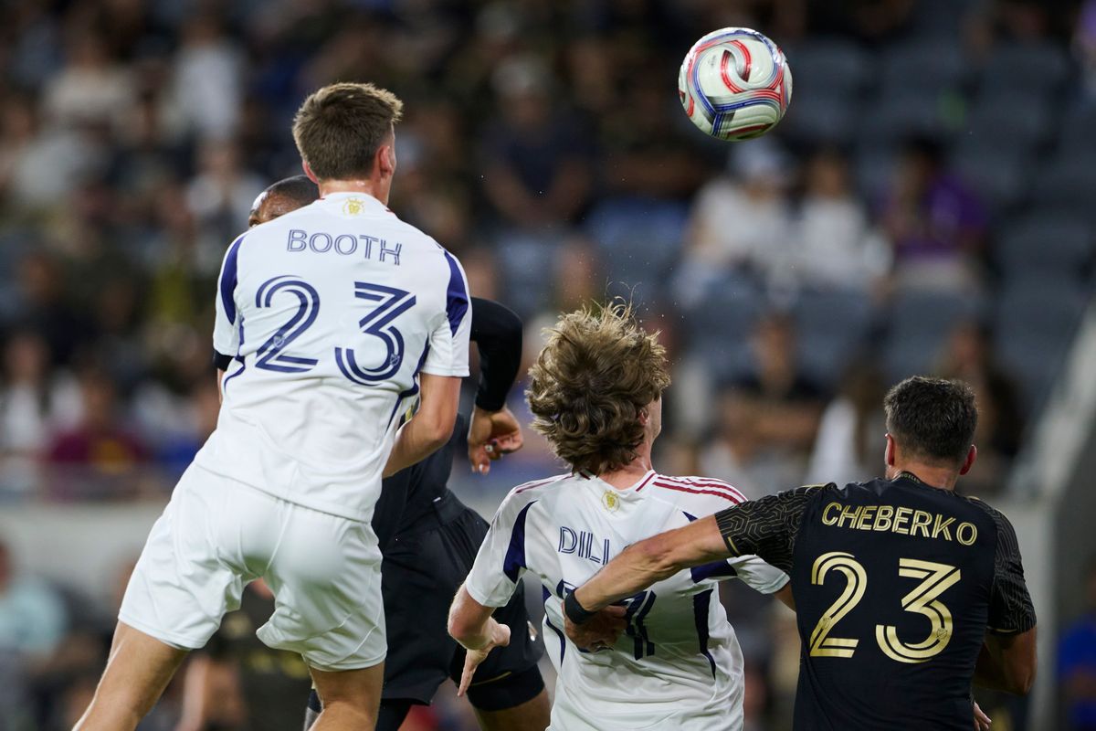 The Real Salt Lake’s Zach Booth #23 jumps for the ball during an MLS game against The Los Angeles FC  on July 22nd, 2026 at BMO Stadium in Los Angeles, California.