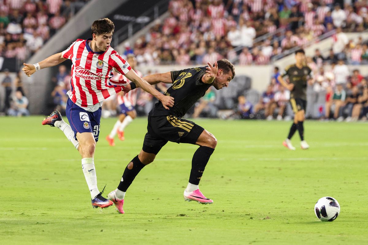 Armando González #34 of Chivas de Guadalajara and Yevhen Cheberko #23 of LAFC chase the ball during a Leagues Cup match, Wednesday August 5, 2026 in Los Angeles, Calif. Armando González #34 of Chivas de Guadalajara and Yevhen Cheberko #23 of LAFC chase the ball during a Leagues Cup match, Wednesday August 5, 2026 in Los Angeles, Calif.
