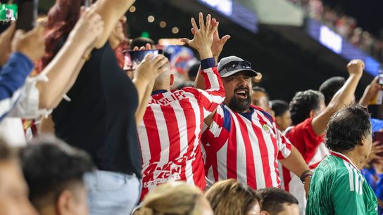 Chivas de Guadalajara fans high five in the stands after a goal during a Leagues Cup match between LAFC and Chivas de Guadalajara, Wednesday August 5, 2026 in Los Angeles, Calif. Chivas de Guadalajara fans high five in the stands after a goal during a Leagues Cup match between LAFC and Chivas de Guadalajara, Wednesday August 5, 2026 in Los Angeles, Calif.
