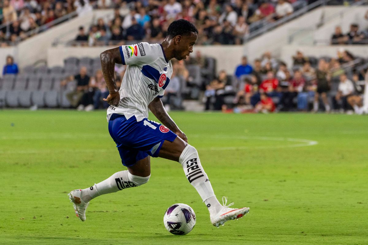 Helinho #11 of Toluca FC dribbles past the defender during a Leagues Cup match against LAFC, Saturday August 8, 2026 in Los Angeles, California.