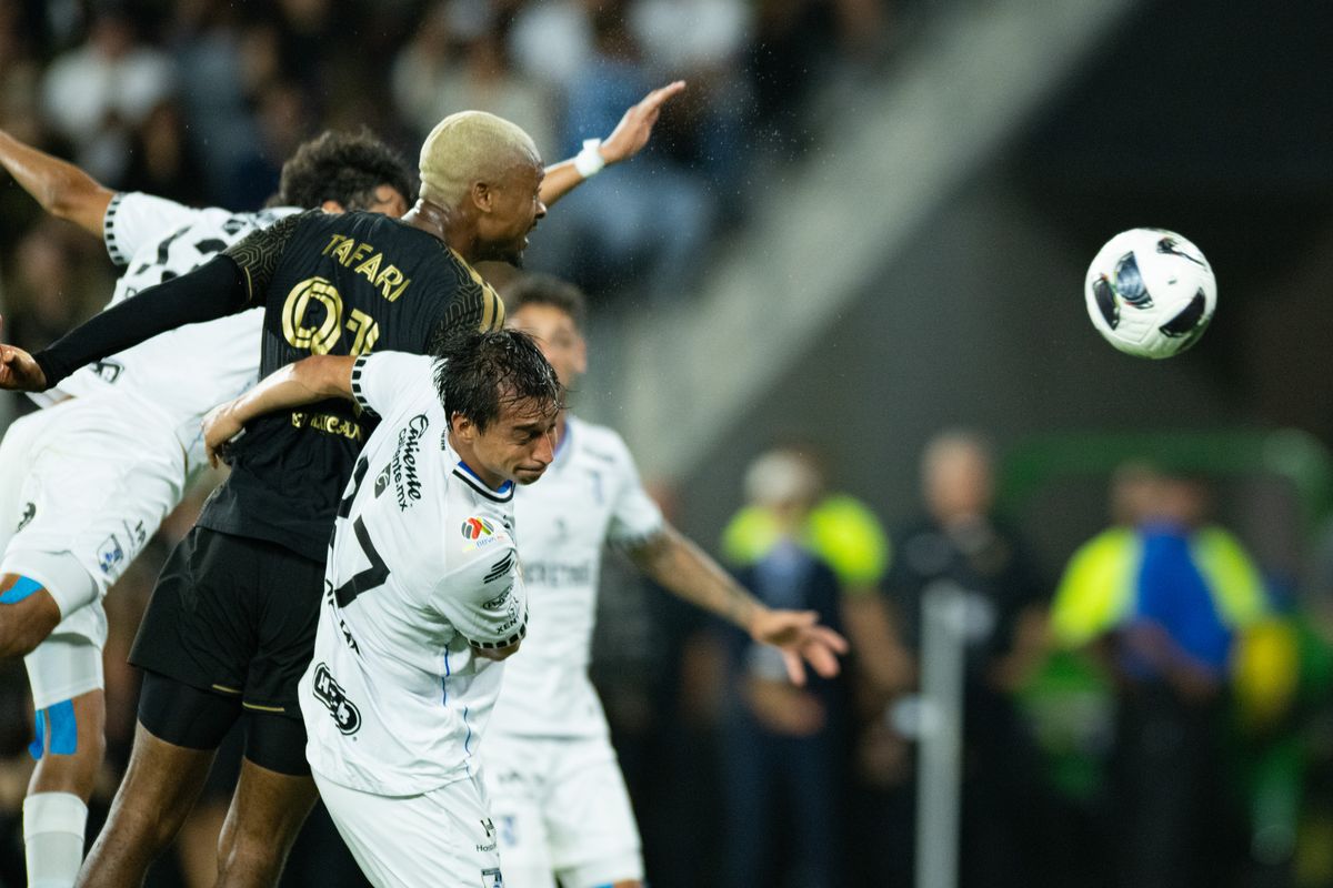 LAFC defender Nkosi Tafari (91) heads the ball during a Leagues Cup match between Queretaro and Los Angeles FC on Wednesday, August 12, 2026 at BMO Stadium in Los Angeles Calif.