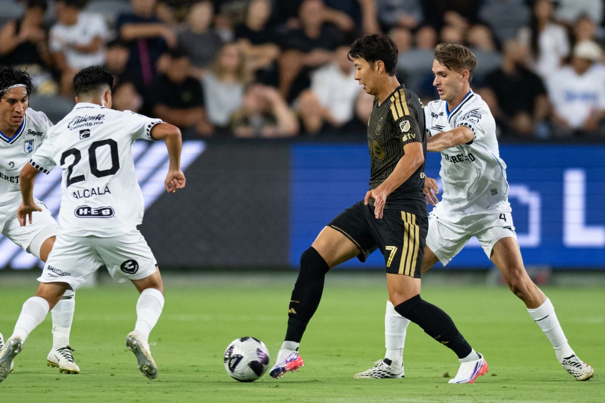 LAFC forward Son Heung-Min (7) controls the ball against Queretaro defenders during a Leagues Cup match between Queretaro and Los Angeles FC on Wednesday, August 12, 2026 at BMO Stadium in Los Angeles Calif.