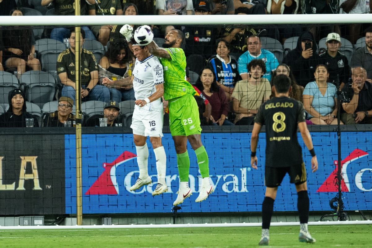 Queretaro goalkeeper Guillermo Allison (25) punches the ball during a Leagues Cup match between Queretaro and Los Angeles FC on Wednesday, August 12, 2026 at BMO Stadium in Los Angeles Calif.