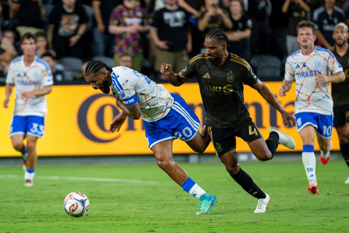 Los Angeles FC midfielder Eddie Segura (4) fouls San Diego FC midfielder Aníbal Godoy (20) during an MLS soccer game, Saturday, August 15, 2026 in Los Angeles, California.