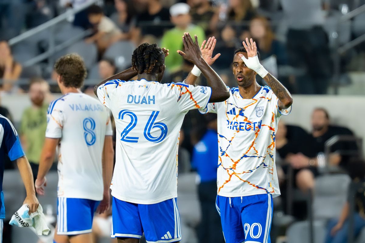 San Diego FC forward Amahl Pellegrino (90) celebrates a win with teammate Manu Duah (26) during an MLS soccer game against Los Angeles FC, Saturday, August 15, 2026 in Los Angeles.