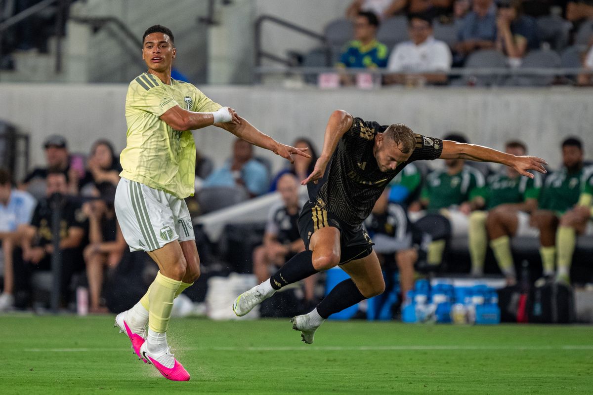 LAFC Ryan Porteous (5) being fouled during a MLS soccer game against the Portland Timbers on August 22nd, 2026 in Los Angeles, CA. LAFC Ryan Porteous (5) being fouled during a MLS soccer game against the Portland Timbers on August 22nd, 2026 in Los Angeles, CA.