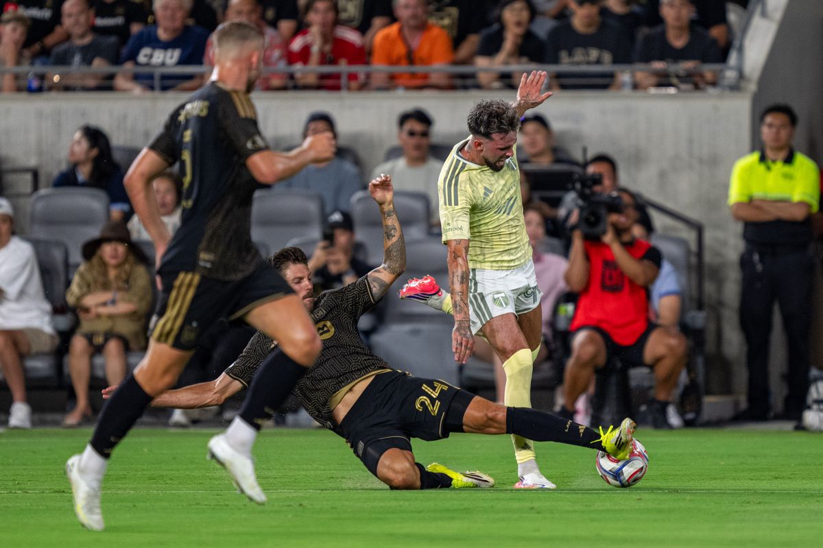 LAFC Ryan Hollingshead (24) stealing the ball during a MLS soccer game against the Portland Timbers on August 22nd, 2026 in Los Angeles, CA. LAFC Ryan Hollingshead (24) stealing the ball during a MLS soccer game against the Portland Timbers on August 22nd, 2026 in Los Angeles, CA.