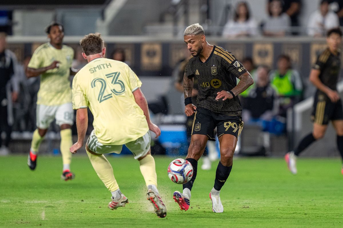 LAFC Denis Bouanga (99) passing the ball to a teammate during a MLS soccer game against the Portland Timbers on August 22nd, 2026 in Los Angeles, CA. LAFC Denis Bouanga (99) passing the ball to a teammate during a MLS soccer game against the Portland Timbers on August 22nd, 2026 in Los Angeles, CA.