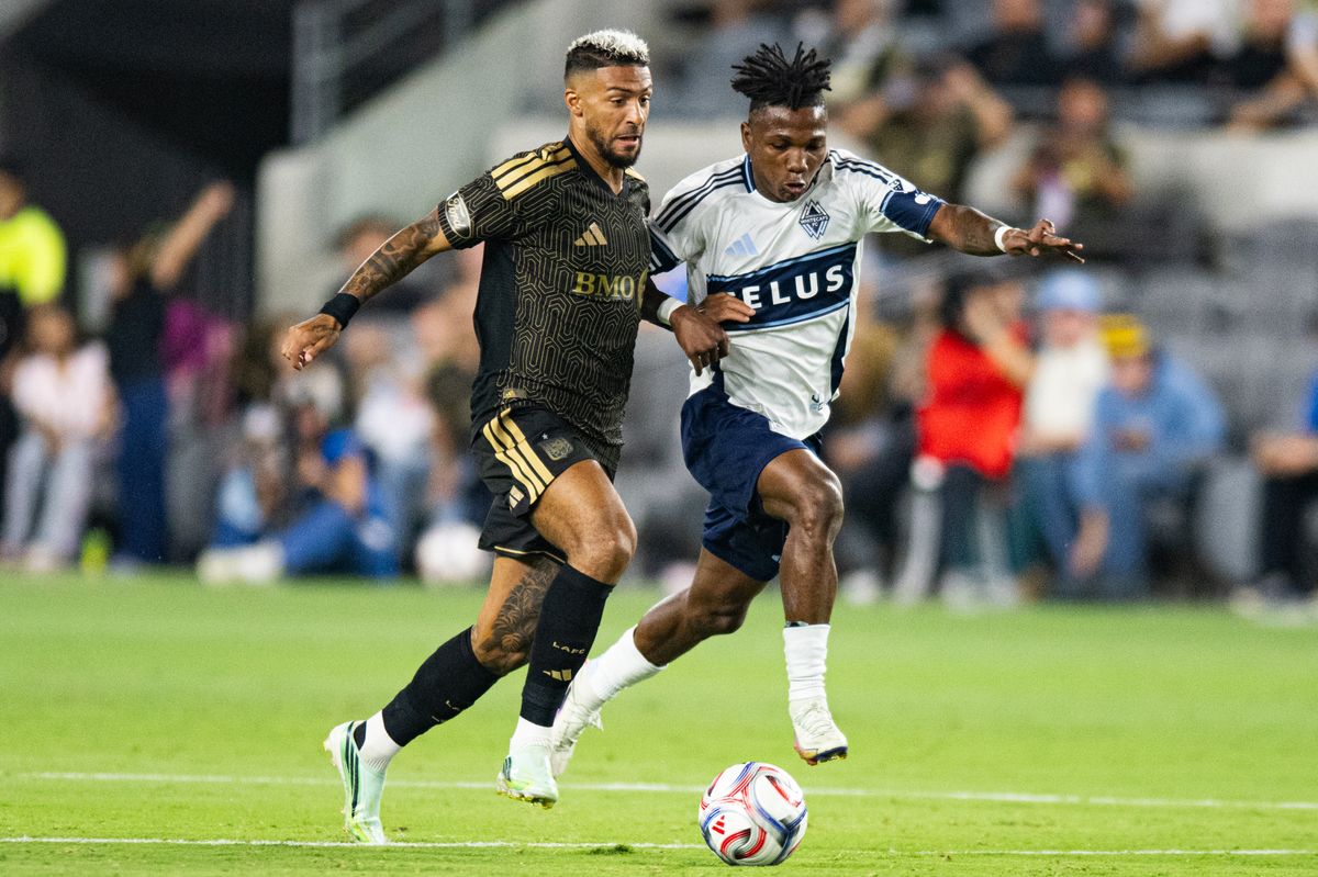 LAFC forward Denis Bouanga (99) battles for control of the ball during an MLS soccer game against the Vancouver Whitecaps, Saturday, October 10, 2026 in Los Angeles. LAFC forward Denis Bouanga (99) battles for control of the ball during an MLS soccer game against the Vancouver Whitecaps, Saturday, October 10, 2026 in Los Angeles.
