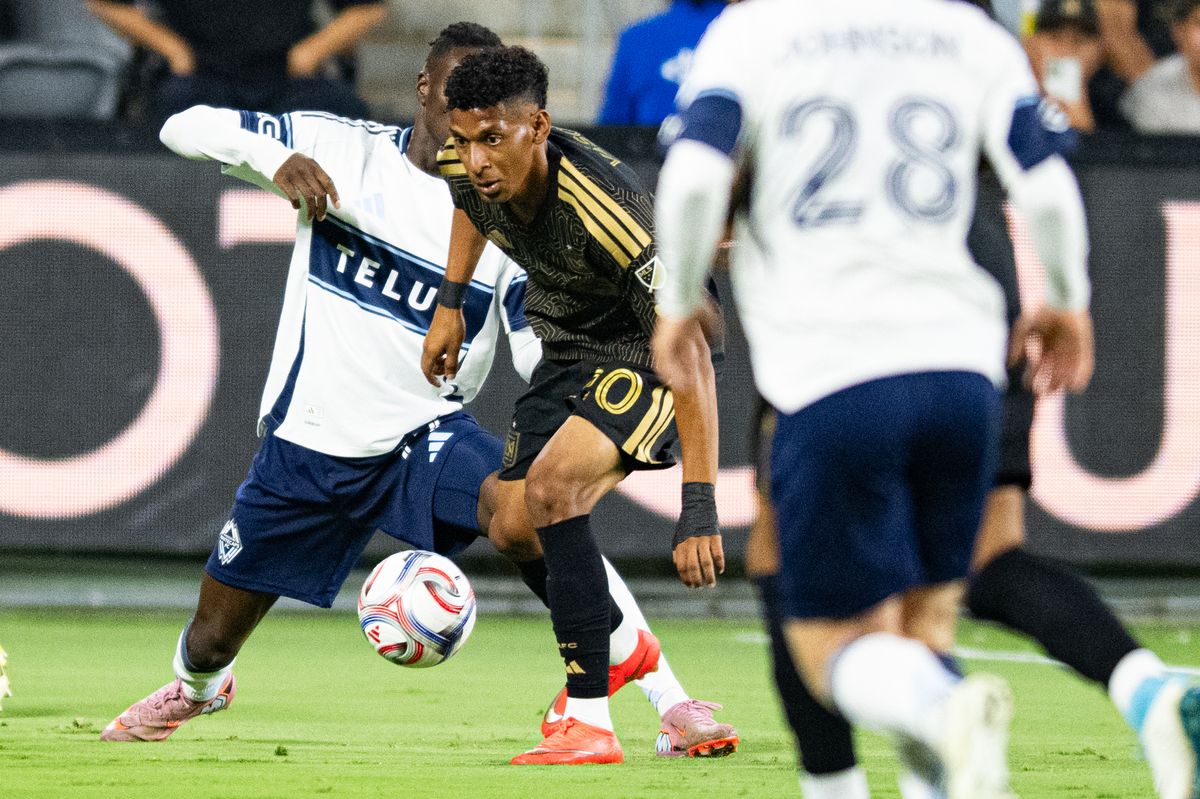 LAFC midfielder Sergio Vásquez (20) takes the ball through defenders during an MLS soccer game against the Vancouver Whitecaps, Saturday, October 10, 2026 in Los Angeles. LAFC midfielder Sergio Vásquez (20) takes the ball through defenders during an MLS soccer game against the Vancouver Whitecaps, Saturday, October 10, 2026 in Los Angeles.