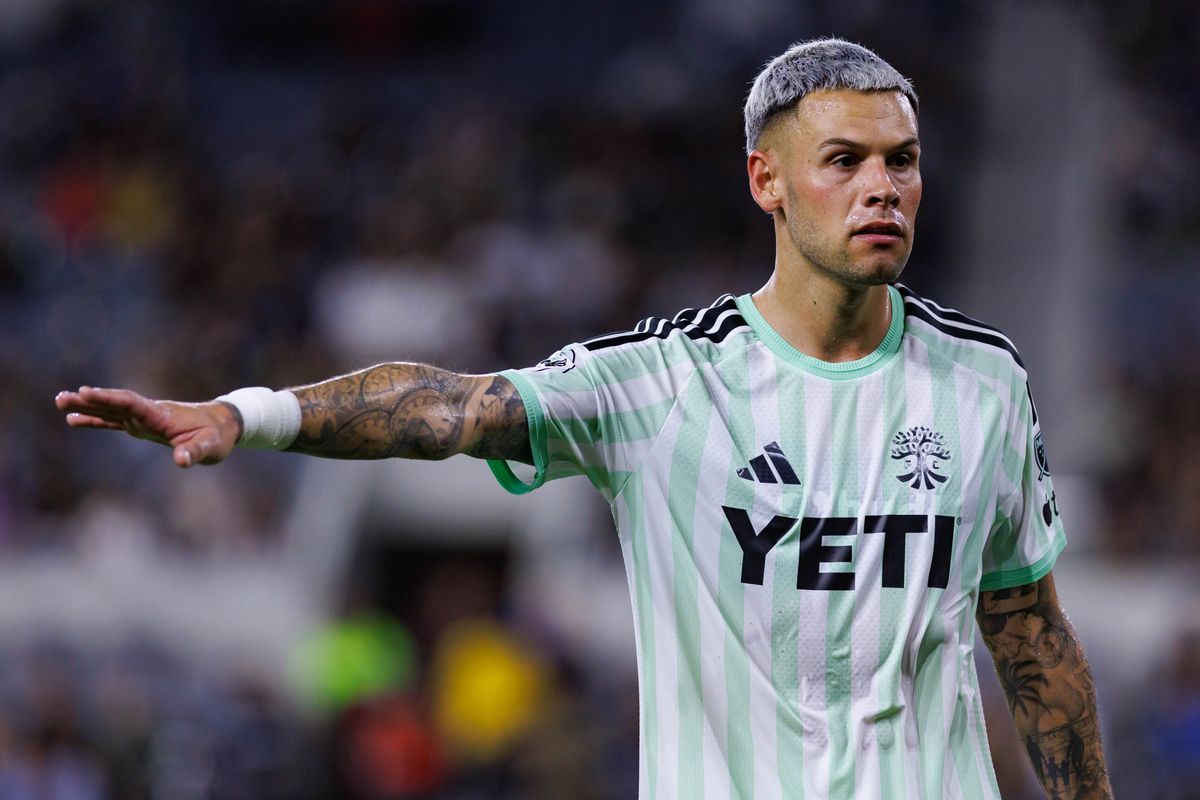 Christian Ramirez #21 of Austin FC signals to teammates during an MLS regular season match against LAFC on October 14, 2026 at BMO Stadium in Los Angeles, California.