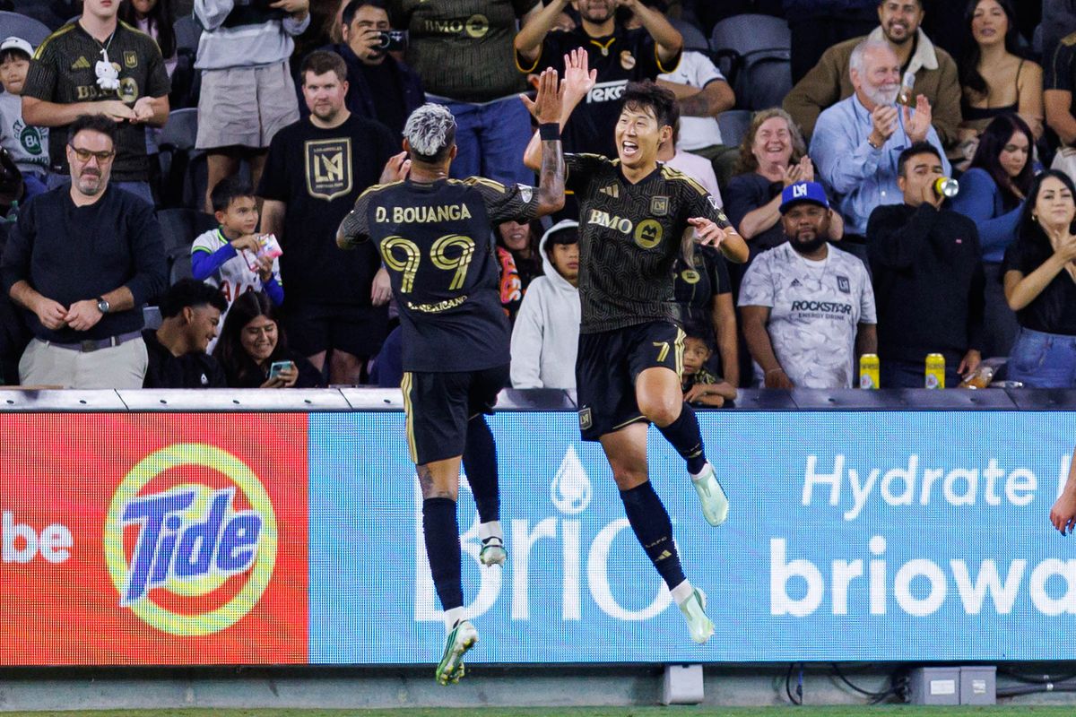 Son Heung-Min #7 of LAFC celebrates with Denis Bouanga #99 of LAFC after scoring a goal during an MLS regular season match against Austin FC on October 14, 2026 at BMO Stadium in Los Angeles, California.
