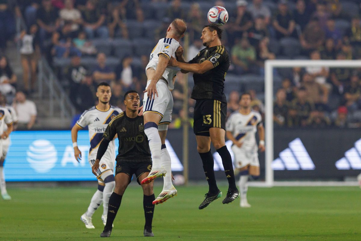 Aaron Long #33 of LAFC heads the ball during an MLS regular season match against LA Galaxy on October 25, 2026 at BMO Stadium in Los Angeles, California. Aaron Long #33 of LAFC heads the ball during an MLS regular season match against LA Galaxy on October 25, 2026 at BMO Stadium in Los Angeles, California.