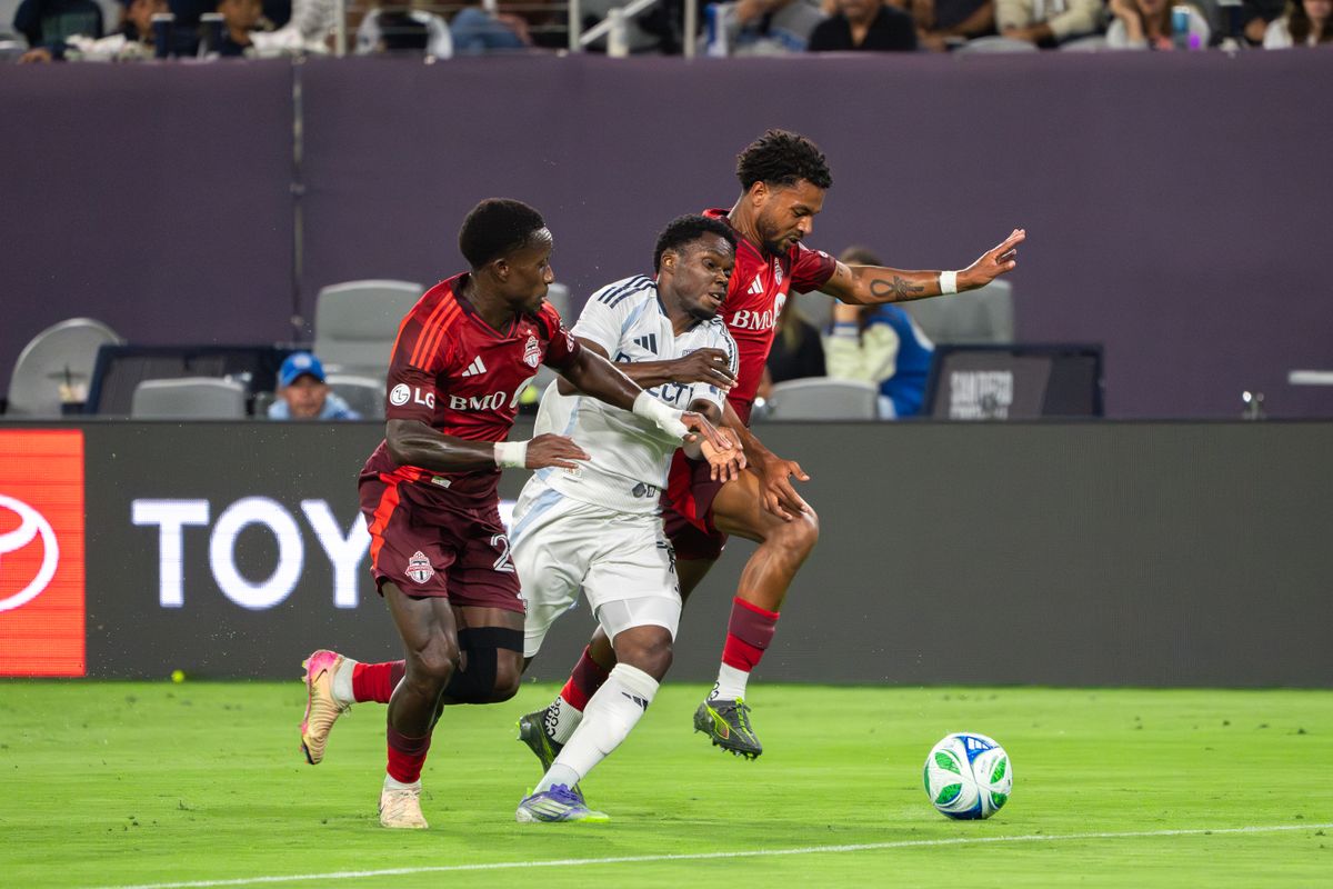 SDFC Forward Alex Mighten #77 getting smashed in between players during an MLS Match against Toronto FC on July 16, 2025 in San Diego, CA.