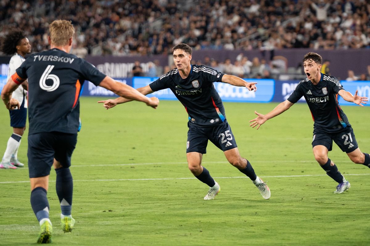 San Diego FC Center Back Ian Pilcher (25) celebrates with teammates after scoring during the second half of an MLS match against Vancouver Whitecaps FC on July 19, 2025 at Snapdragon Stadium in San Diego, CA.