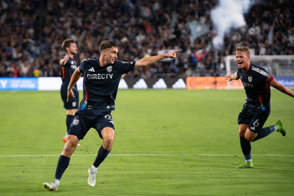 San Diego FC Center Back Ian Pilcher (25) celebrates with teammates after scoring during the second half of an MLS match against Vancouver Whitecaps FC on July 19, 2025 at Snapdragon Stadium in San Diego, CA.