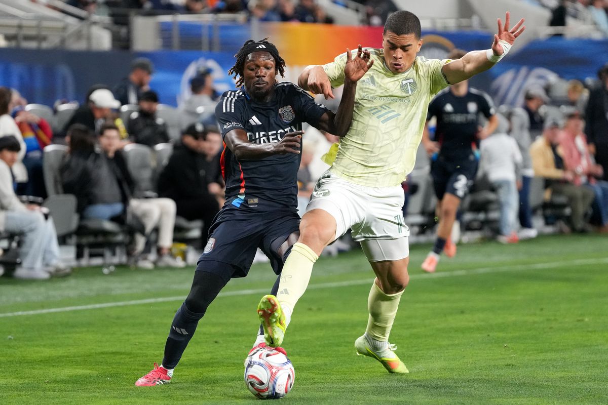 San Diego FC midfielder Manu Duah (26) battles for the ball during an MLS soccer game against the Portland Timbers, Saturday April 25, 2026 in San Diego, California.