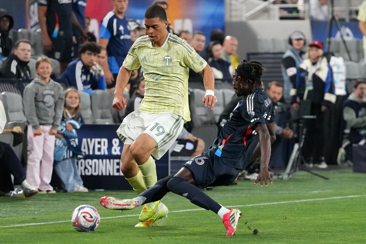 San Diego FC midfielder Manu Duah (26) slides for the ball during an MLS soccer game against the Portland Timbers, Saturday April 25, 2026 in San Diego, California.
