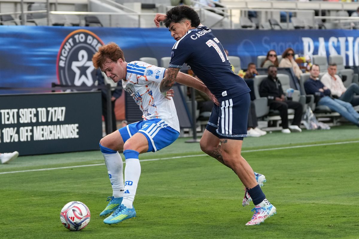 San Diego FC defender Kieran Sargeant (5) shields the ball during an MLS soccer game against the Vancouver Whitecaps, Saturday May 23, 2026 in San Diego, California.