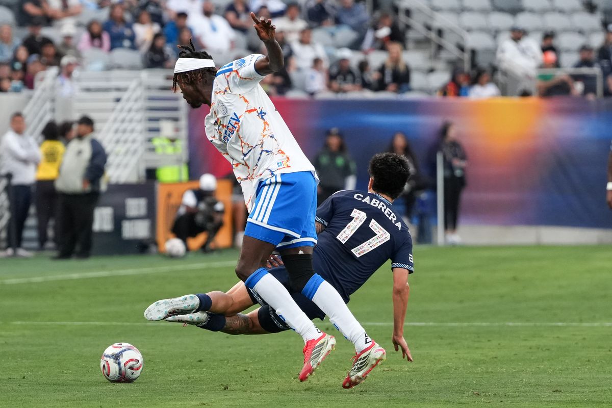 San Diego FC midfielder Manu Duah (26) knocks down Vancouver Whitecaps forward Kenji Cabrera (17) during an MLS soccer game against the Vancouver Whitecaps, Saturday May 23, 2026 in San Diego, California.