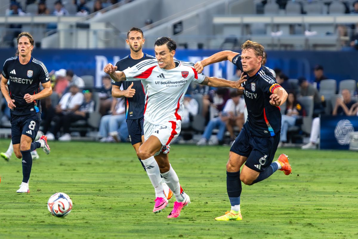 FC Dallas forward Petar Musa (9) dribbles away from San Diego FC midfielder Jeppe Tverskov (6) during an MLS soccer game, Saturday, July 25, 2026 in San Diego, California. FC Dallas forward Petar Musa (9) dribbles away from San Diego FC midfielder Jeppe Tverskov (6) during an MLS soccer game, Saturday, July 25, 2026 in San Diego, California.