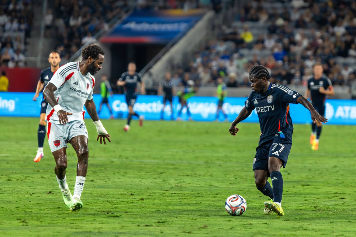 San Diego FC forward Alex Mighten (77) challenges FC Dallas defender Sebastien Ibeagha (25) during an MLS soccer game, Saturday, July 25, 2026 in San Diego, California. San Diego FC forward Alex Mighten (77) challenges FC Dallas defender Sebastien Ibeagha (25) during an MLS soccer game, Saturday, July 25, 2026 in San Diego, California.