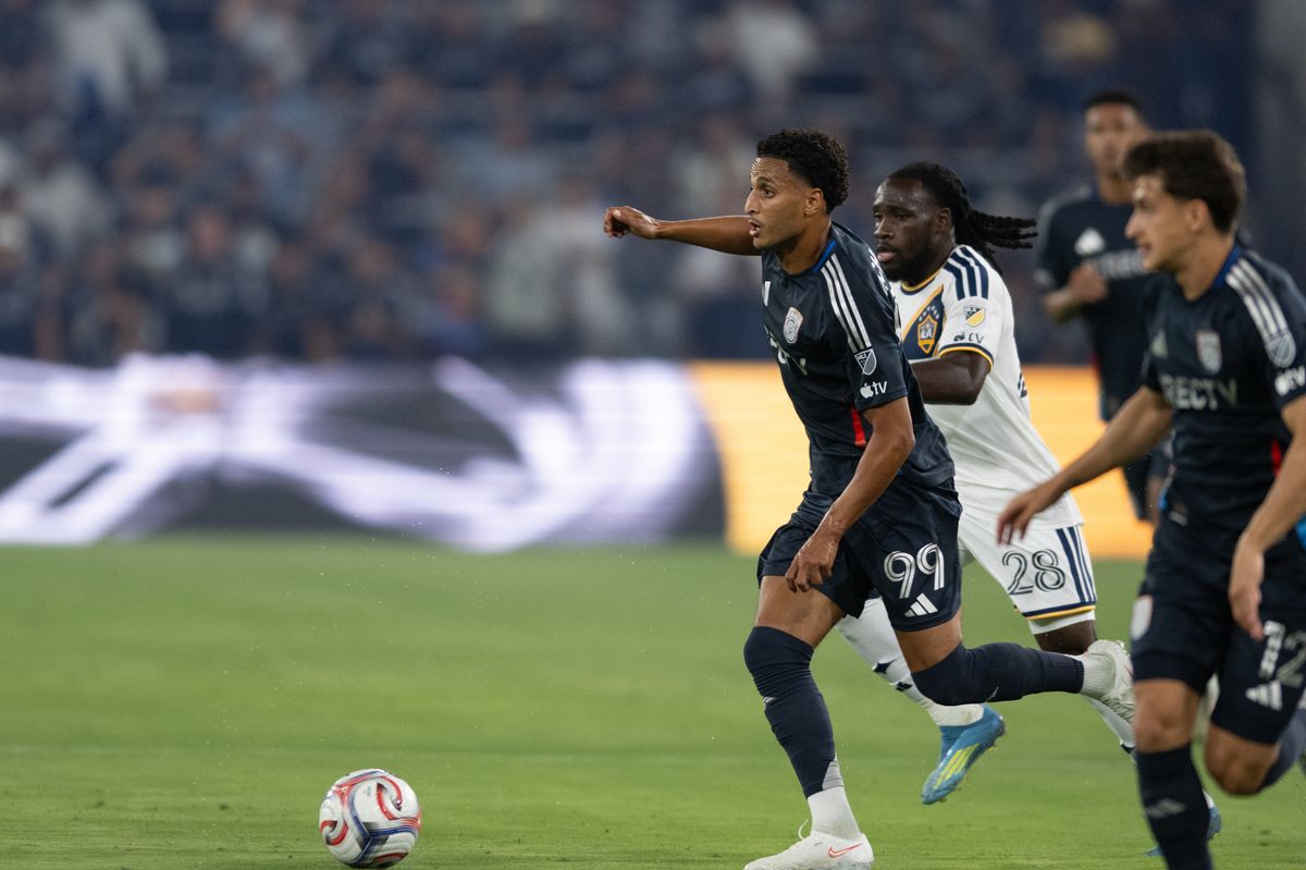 San Diego FC midfielder Elias Achouri (99) pushes the ball past defenders during an MLS match between Los Angeles Galaxy and San Diego SC on Saturday, August 29, 2026 at Snapdragon Stadium in San Diego, California. San Diego FC midfielder Elias Achouri (99) pushes the ball past defenders during an MLS match between Los Angeles Galaxy and San Diego SC on Saturday, August 29, 2026 at Snapdragon Stadium in San Diego, California.
