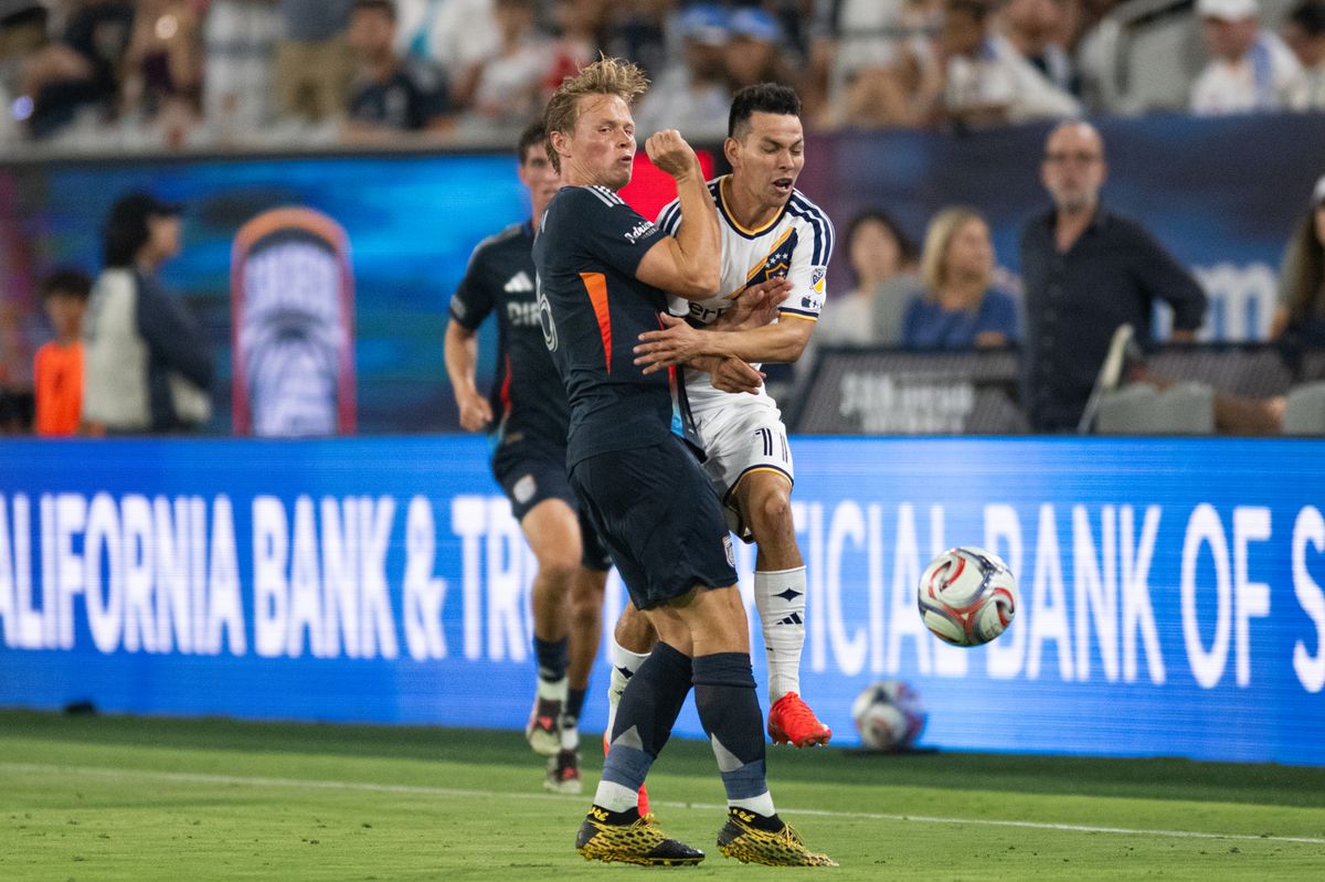 LA Galaxy forward Hirving Lozano (11) gets a hard tackle during an MLS match between Los Angeles Galaxy and San Diego SC on Saturday, August 29, 2026 at Snapdragon Stadium in San Diego, California. LA Galaxy forward Hirving Lozano (11) gets a hard tackle during an MLS match between Los Angeles Galaxy and San Diego SC on Saturday, August 29, 2026 at Snapdragon Stadium in San Diego, California.