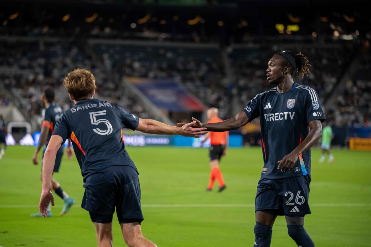 San Diego FC defender Manu Duah (26) high fives his teammate during an MLS soccer game against Seattle Sounders, Saturday, October 24, 2026 in San Diego, California. San Diego FC defender Manu Duah (26) high fives his teammate during an MLS soccer game against Seattle Sounders, Saturday, October 24, 2026 in San Diego, California.