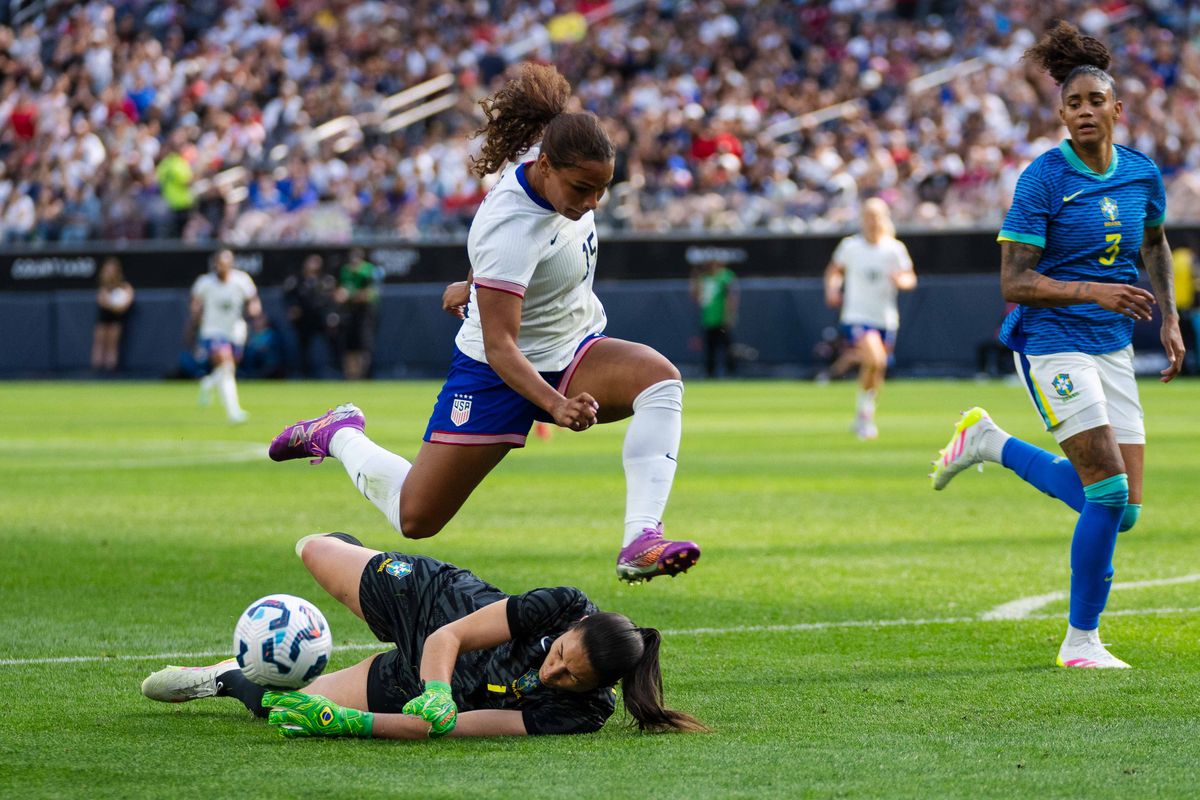 US Women’s National Team forward Michelle Cooper (15) leaping over her opponent at a friendly match against Brazil on April 5th, 2025 in Inglewood California